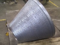 Fabricated cone with hardface weld on outside surface 